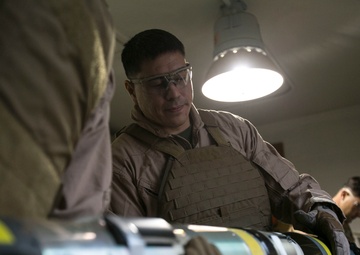 Steady hands: EOD technicians disarm Griffin missile