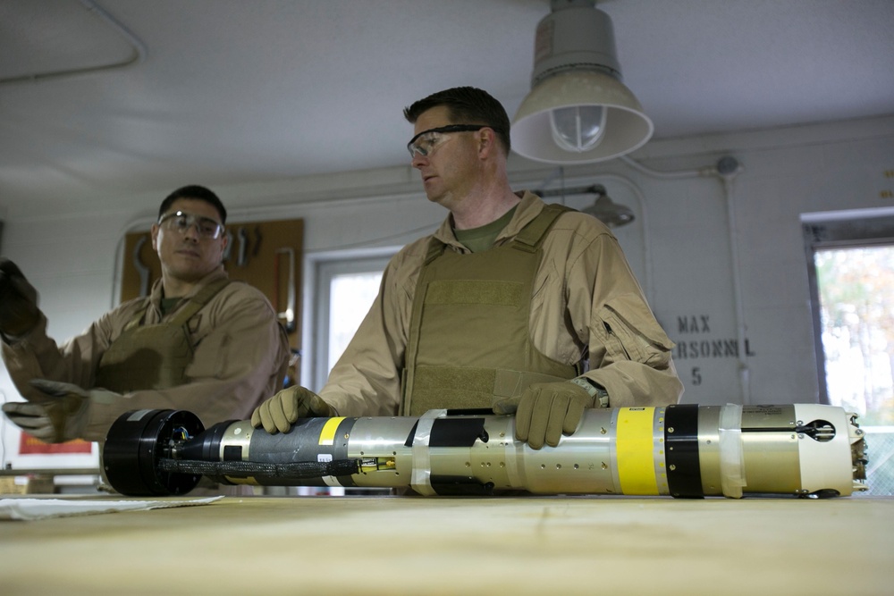 Steady hands: EOD technicians disarm Griffin missile