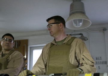 Steady hands: EOD technicians disarm Griffin missile
