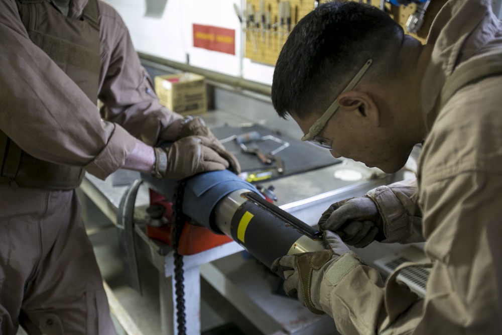 Steady hands: EOD technicians disarm Griffin missile