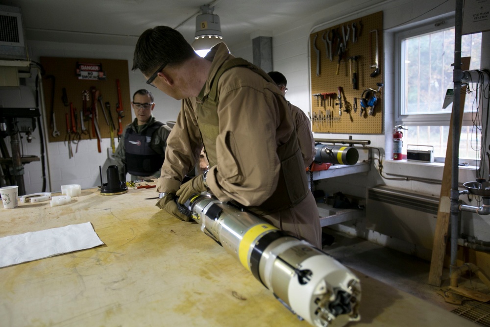 Steady hands: EOD technicians disarm Griffin missile