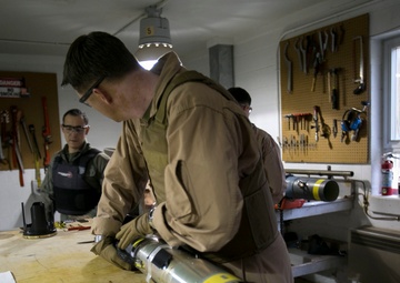 Steady hands: EOD technicians disarm Griffin missile