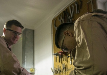 Steady hands: EOD technicians disarm Griffin missile