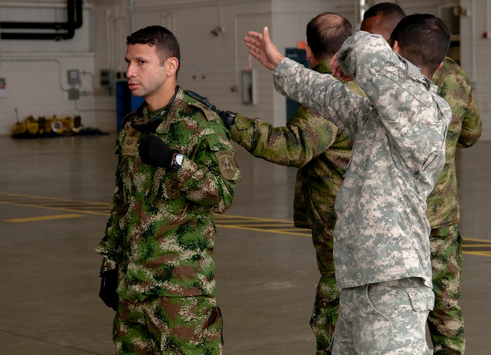 Partner nation jumpmasters defy language barriers during Operation Toy Drop