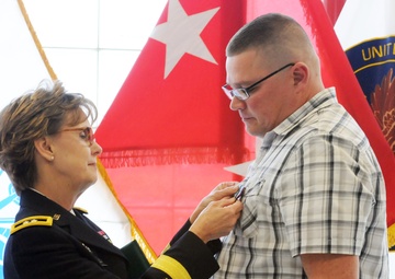88th RSC Army Reserve military technician presented the Civilian Humanitarian Service Medal for actions preventing double homicide