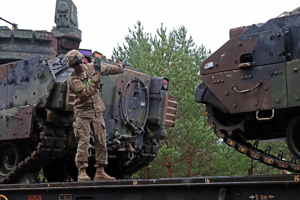 Soldiers load trains with hearts set on home