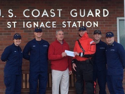 Coast Guard members donate to holiday meal drive