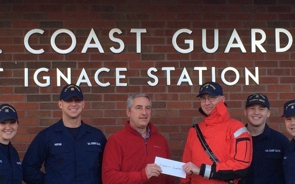 Coast Guard members donate to holiday meal drive