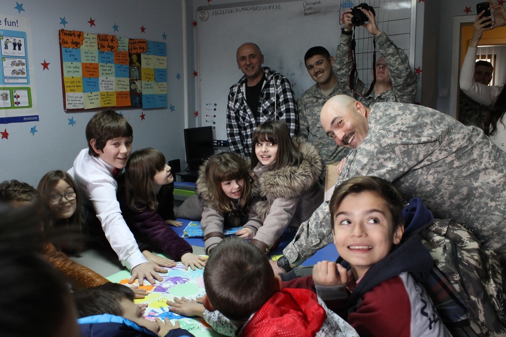 US Soldiers conduct team-building games in Kosovo