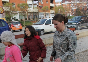 US Soldiers conduct team-building games in Kosovo