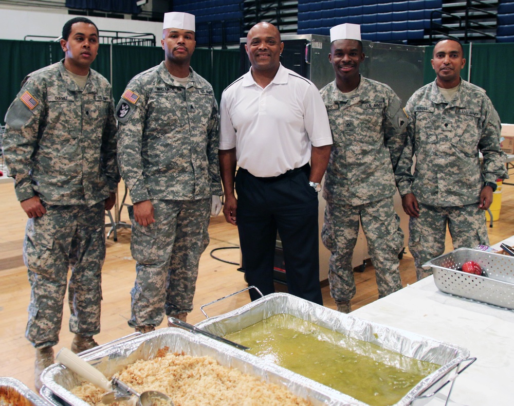 Retired Redskins player Brian Mitchell visits District National Guard soldiers