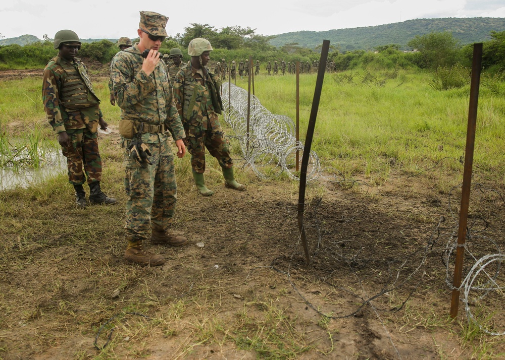 Breaching the barrier: Ugandans, U.S. Marines blow through obstacles