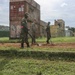 Breaching the barrier: Ugandans, U.S. Marines blow through obstacles