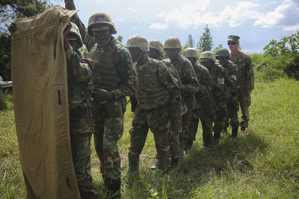 Breaching the barrier: Ugandans, U.S. Marines blow through obstacles