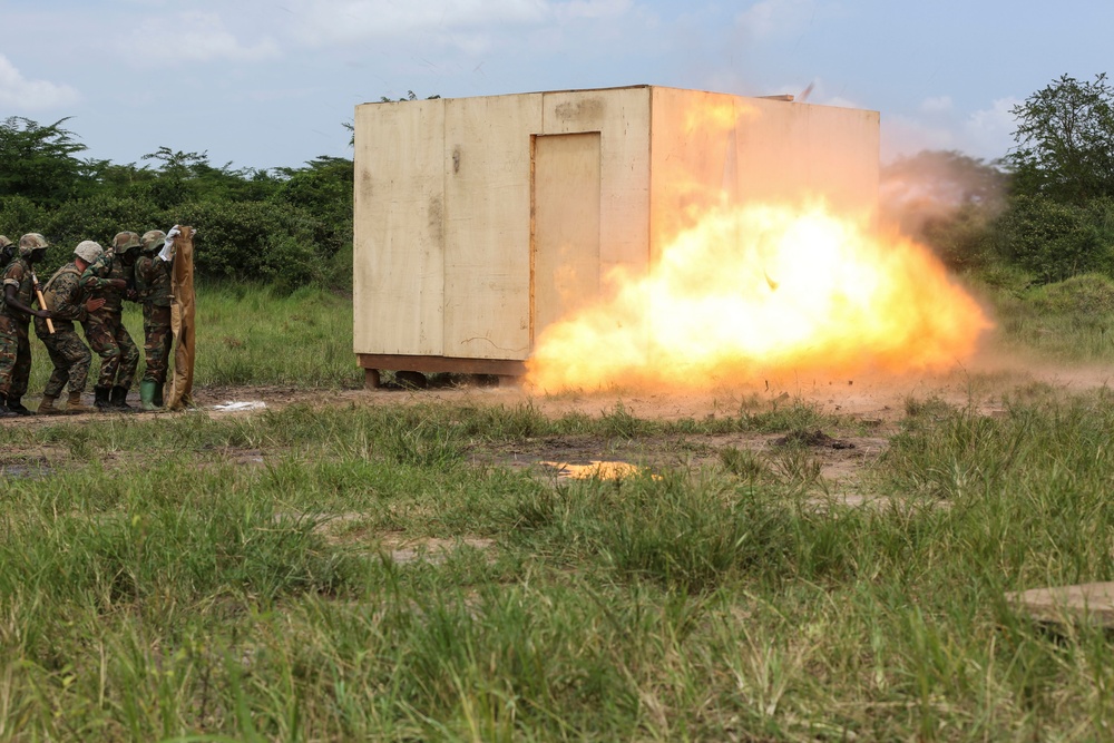 Breaching the barrier: Ugandans, U.S. Marines blow through obstacles