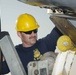 Navy diver loads boat