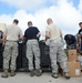 Airmen spread holiday cheer during Operation Christmas Drop sorting party