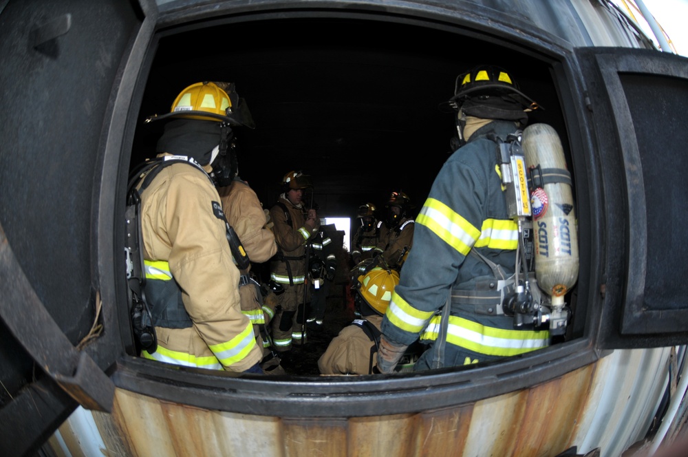 109th, community firefighters complete live fire training