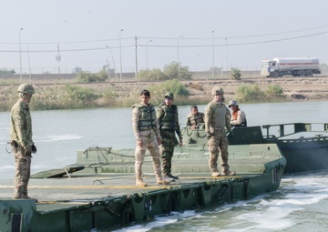 Iraqi engineers assemble float bridges
