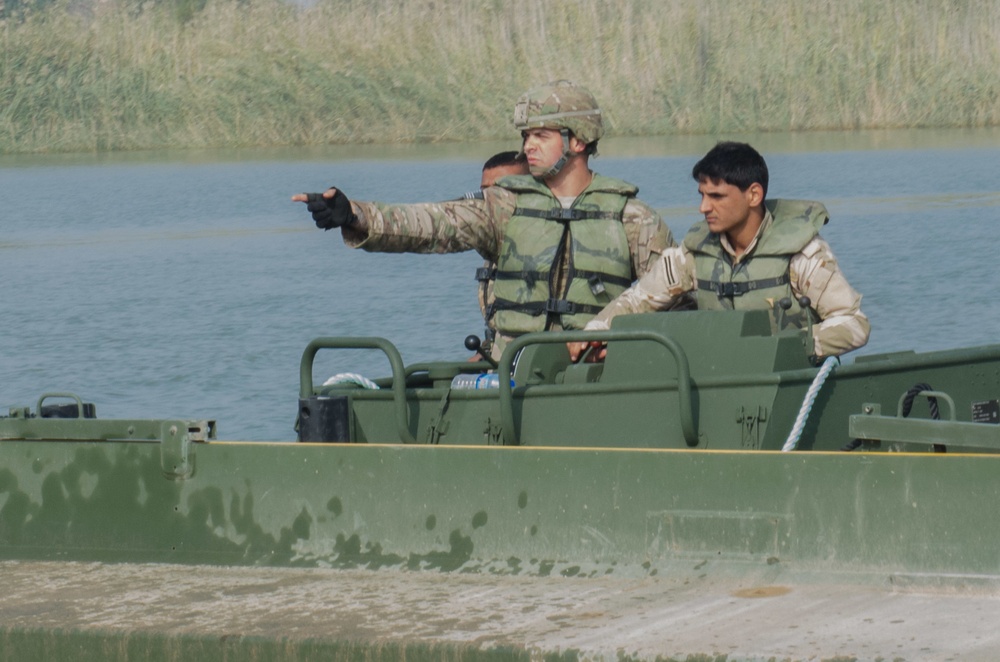 Iraqi engineers assemble float bridges