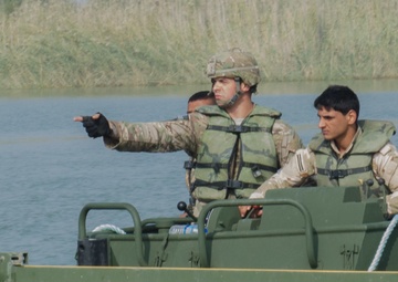 Iraqi engineers assemble float bridges