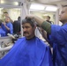 U.S. Marines experience the USS Anchorage barbershop