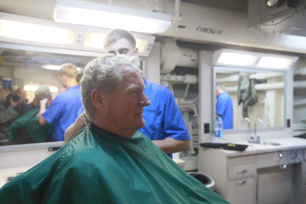 U.S. Marines experience the USS Anchorage barbershop