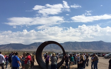 Visitors attend the Trinity Site Open House