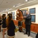 DSD claps as the Army a pep rally band and cheerleaders perform in the halls of the Pentagon