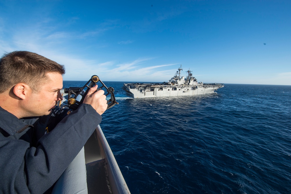 USS Harpers Ferry conducts replenishment