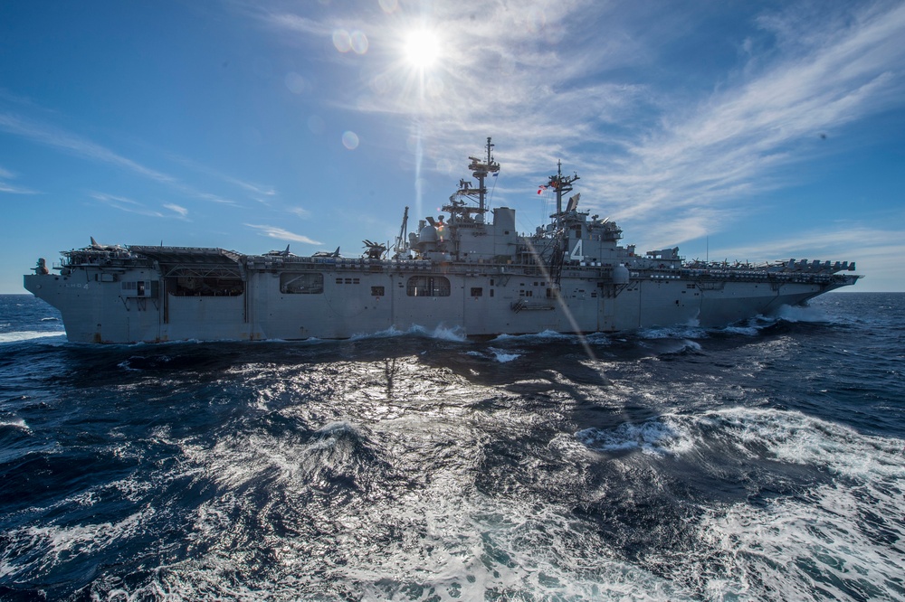 USS Harpers Ferry conducts replenishment