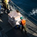 Marines and Sailors work together during replenishment-at-sea