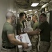 Marines and Sailors work together during replenishment-at-sea