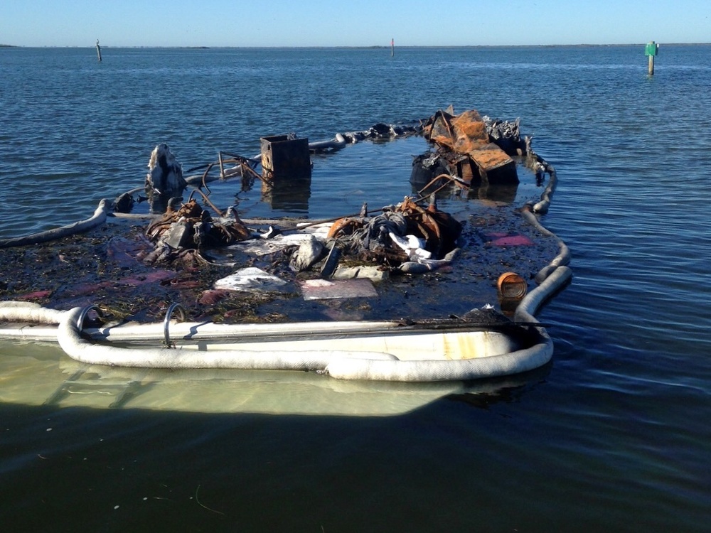 Coast Guard responds to pollution from beached boat