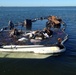 Coast Guard responds to pollution from beached boat