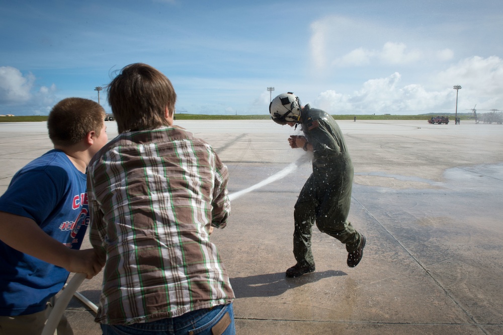 Helicopter Sea Combat Squadron (SHC) 25 officer celebrates last flight flown