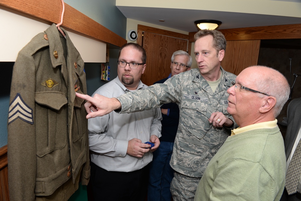 Col. Kent Olson presents Bronze Star to WWII vet