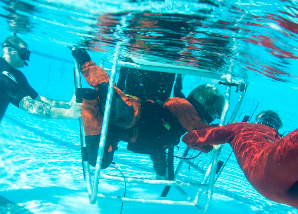 Coast Guard Air Station Los Angeles crew conducts emergency aircraft evacuation training