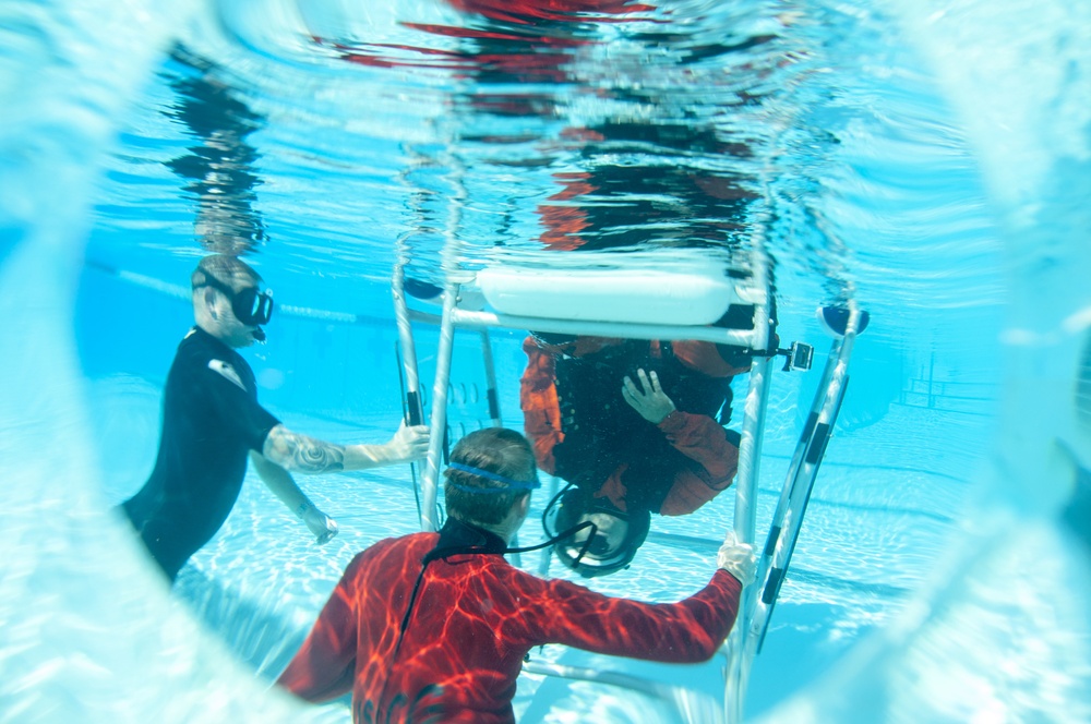 Coast Guard Air Station Los Angeles crew conducts emergency aircraft evacuation training