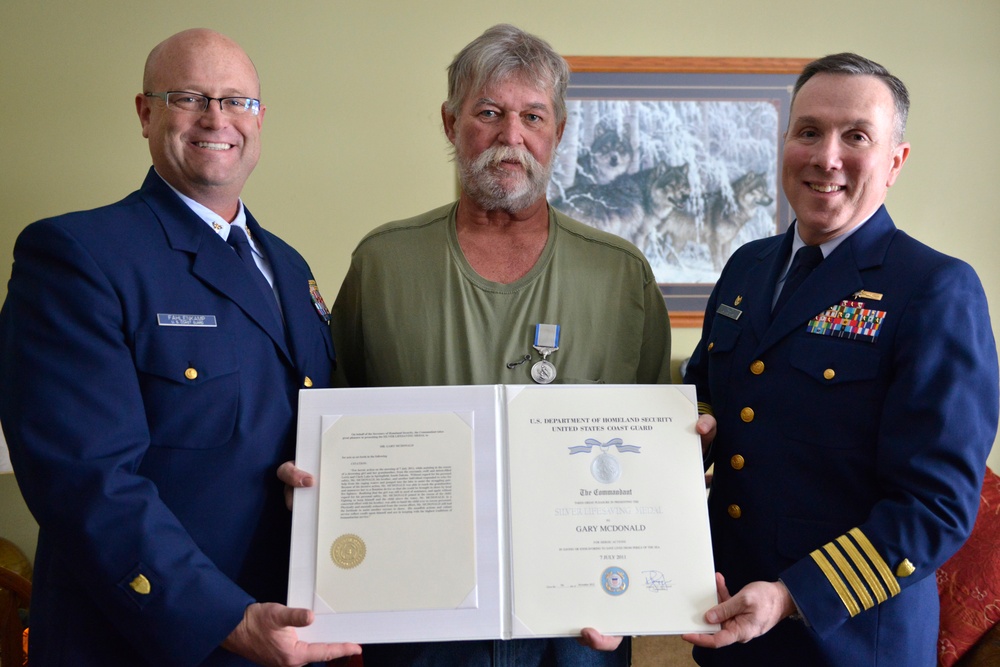 Gary McDonald receives Silver Lifesaving Medal