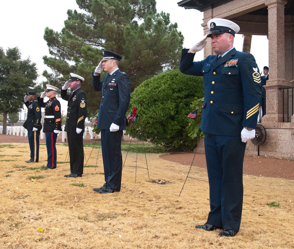 Honoring Fallen Heroes volunteers place wreaths at Fort Bliss National Cemetery