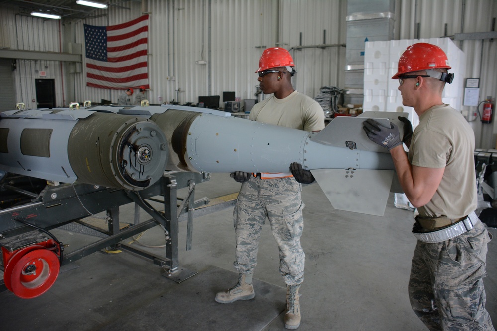 Munitions airmen build bombs at record pace