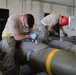 Munitions airmen build bombs at record pace