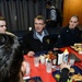 Secretary of defense speaks with Sailors and Marines during his visit on the mess decks aboard the amphibious assault ship USS Kearsarge