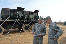 Ready and Resilient: Senior NCO assists platoon leader during Table VIII certifications