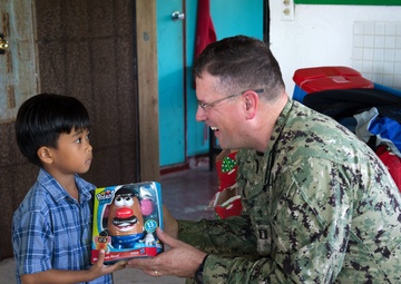 Crew members assigned to USCGC Washington (WPB-1331) participate in Operation Christmas Drop