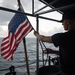Crew members assigned to USCGC Washington (WPB-1331) conduct evening colors