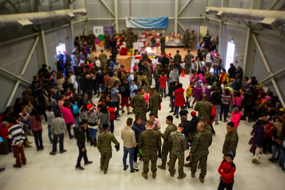 U.S. military members celebrate Christmas early with Romanian children