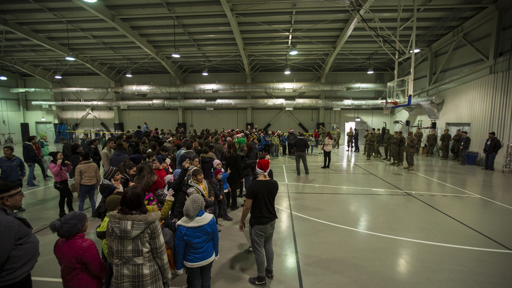 U.S. military members celebrate Christmas early with Romanian children