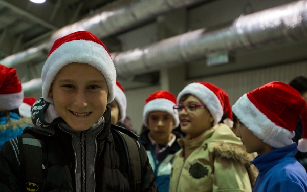U.S. military members celebrate Christmas early with Romanian children